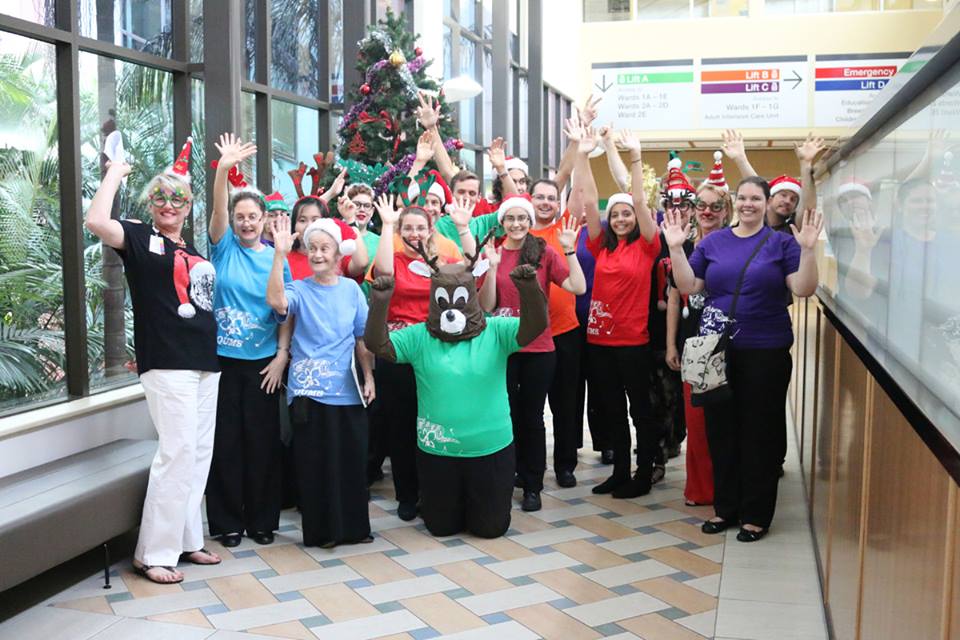Photograph of QUMSians about to carol at Prince Charles Hospital, 2015